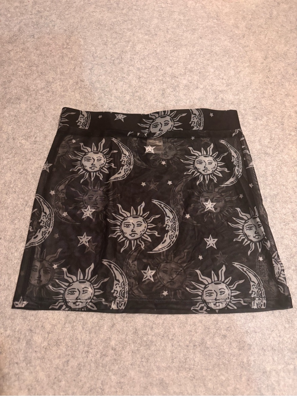 iHeartRaves Black Mesh Mini Rave Skirt with Moon, Stars, and Sun pattern